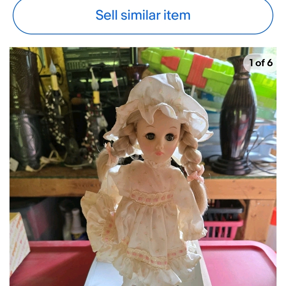 Charming Porcelain Doll with Pink Accents